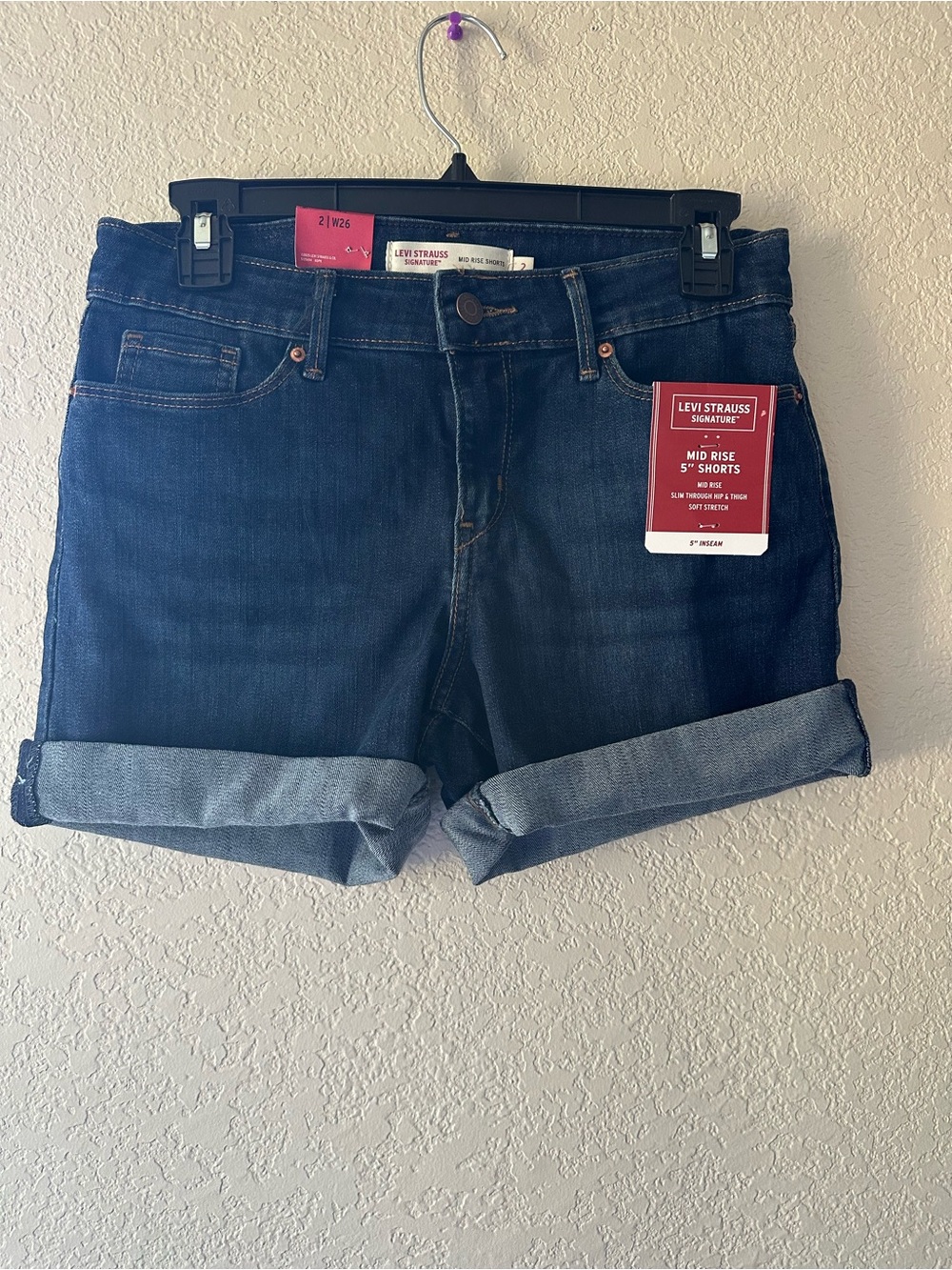 Levi's Women's Dark Blue Rolled Cuff Mid-Rise Jean Shorts size 2|W26